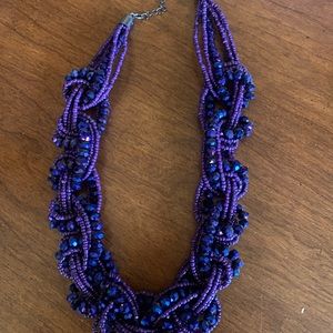 Purple sequin shiny necklace.
